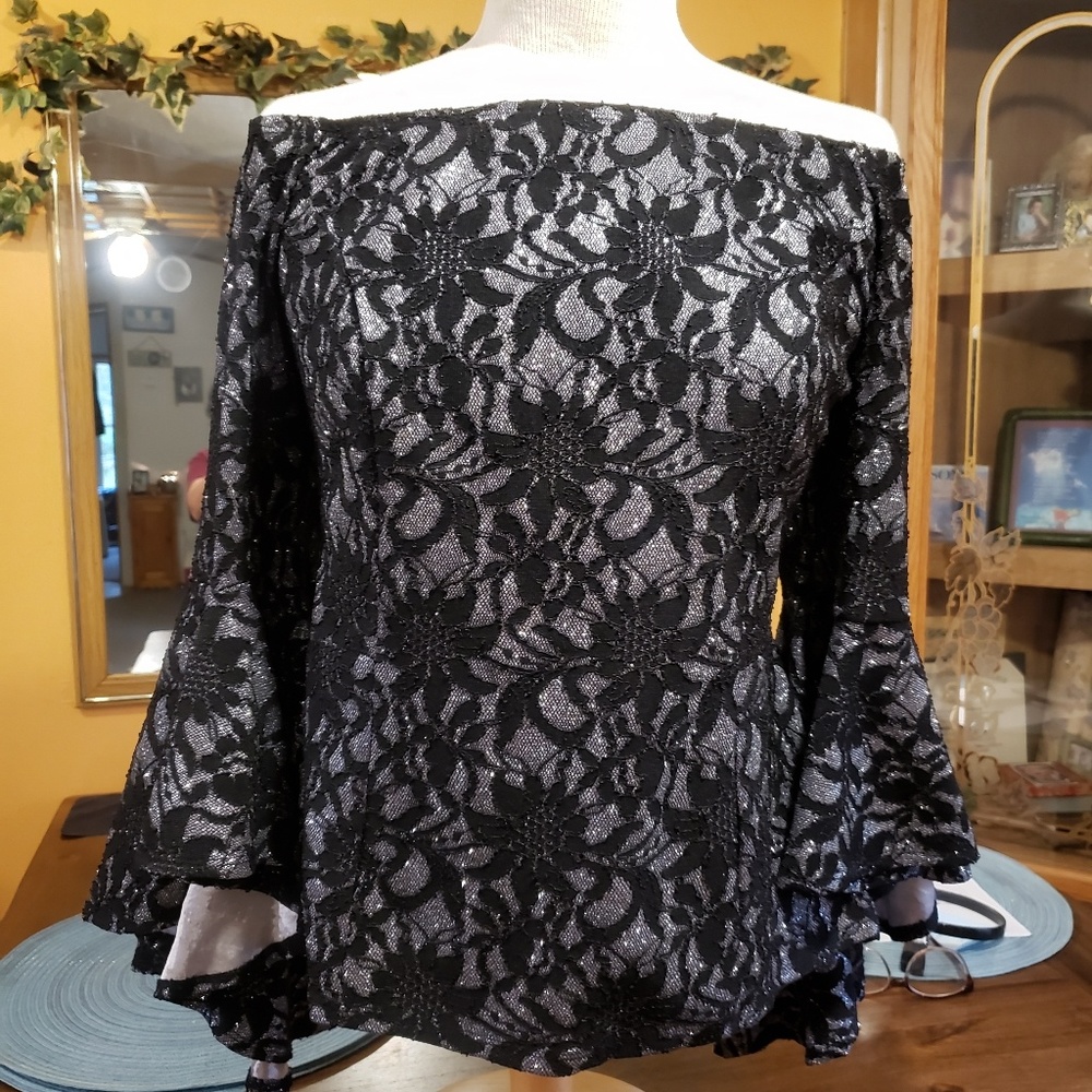 Wide off or on shoulder, glitter detail, bell cuff